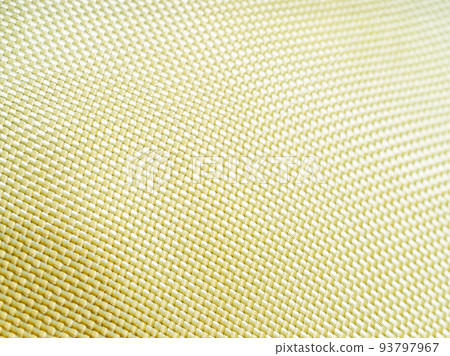 Bulletproof material aramid. Aramid kevlar background. Golden kevlar texture and pattern. Bulletproof material aramid. Aramid kevlar background. Golden kevlar texture and pattern. 93797967