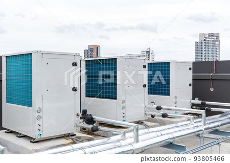 Air conditioner compressor installed on roof building.  93805466