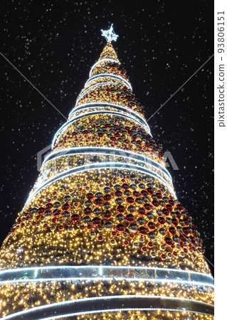 Image of large christmas tree illuminated at night. Image of large christmas tree illuminated at night. 93806151