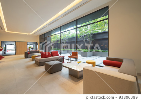 Inside of modern hotel lobby, entrance and reception, waiting area with urban city view of outdoor, indoor. Inside of modern hotel lobby, entrance and reception, waiting area with urban city view of outdoor, indoor. 93806389