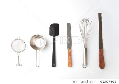 Arranged various cooking utensils white background 93807493
