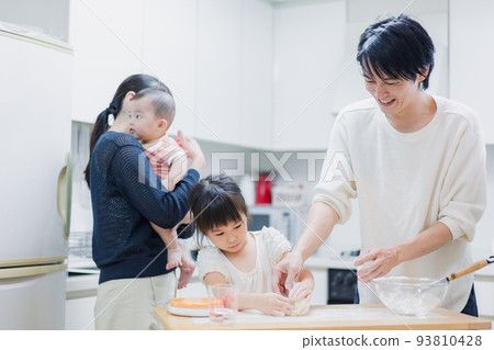 family cooking together family cooking together 93810428