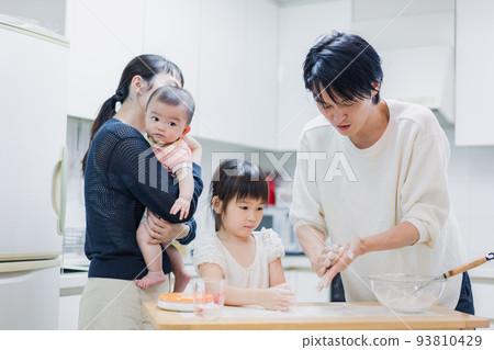 family cooking together family cooking together 93810429