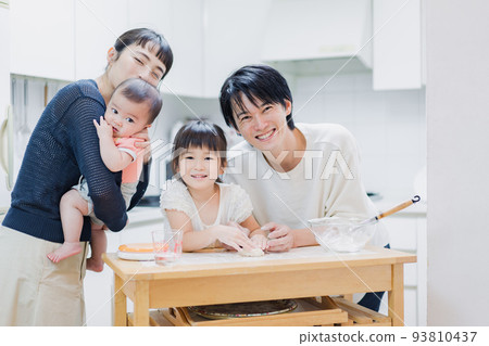 family cooking together 93810437