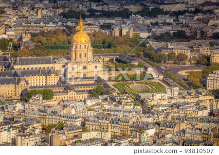 Les Invalides and parisian roofs at sunrise Paris, France 93810507