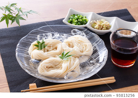 Somen with blue maple on a glassware 93813256