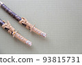 A short Japanese sword placed in a Japanese-style room 93815731