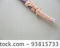 A red Japanese sword placed in a Japanese-style room 93815733