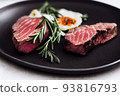 delicious steak on black plate served with rosemary 93816793