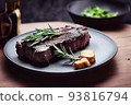 delicious beef steak on black plate served with rosemary 93816794