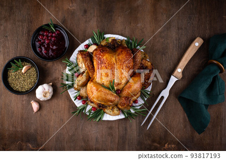 Christmas baked chicken for festive dinner. 93817193