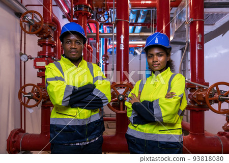Engineer or technician work checking Fire suppression system and fire equipment Engineer or technician work checking Fire suppression system and fire equipment 93818080