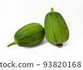 A pair of green luffa lay on white background 93820168
