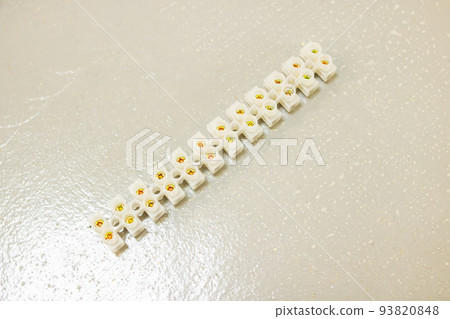 Set of clamps for terminals on gray background 93820848