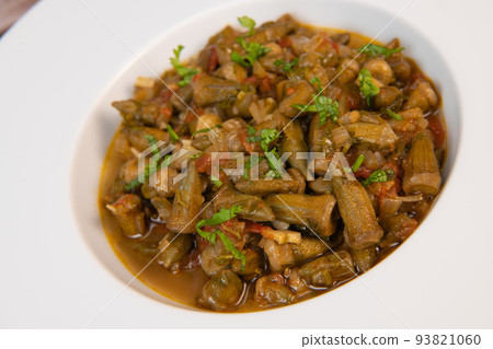 Bhindi masala or ladies finger fry served with indian roti chapati or Indian Flat bread Bhindi masala or ladies finger fry served with indian roti chapati or Indian Flat bread 93821060