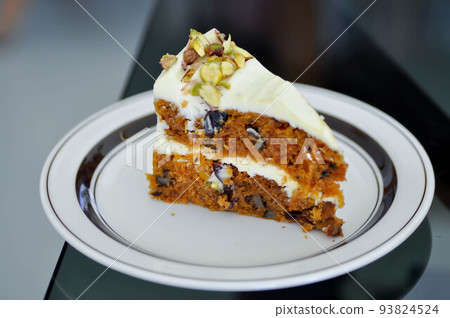 carrot and raisin cake with pistachio topping , carrot cake carrot and raisin cake with pistachio topping , carrot cake 93824524
