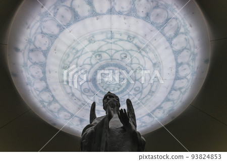 An ancient statue of the archangel on the mural and fresco background An ancient statue of the archangel on the mural and fresco background 93824853