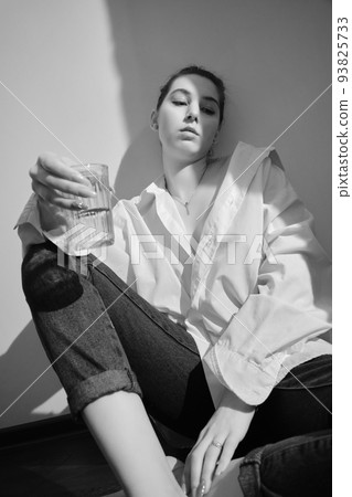 young woman with alcohol 93825733