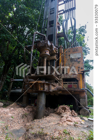 Ground water hole drilling machine installed on the old truck. Ground water hole drilling machine installed on the old truck. 93830079