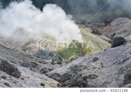 tower of crystallized sulfur around a solfatara in the fumarole field on the slope of a volcano 93831196