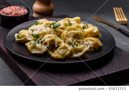 Delicious fresh dumplings with turkey meat, with spices and herbs Delicious fresh dumplings with turkey meat, with spices and herbs 93831515