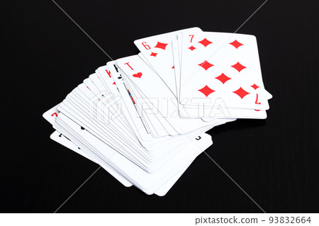 Deck of cards on a wooden table Deck of cards on a wooden table 93832664