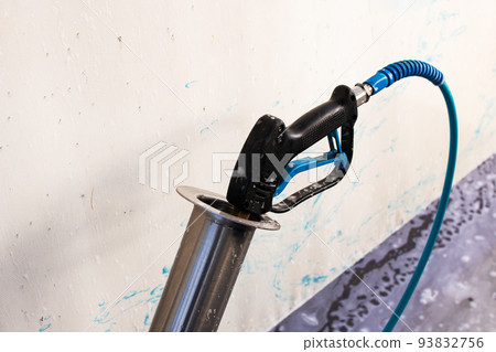 Car wash gun at a car wash Car wash gun at a car wash 93832756
