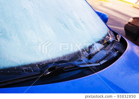 Ice bloom on blue surface of car Ice bloom on blue surface of car 93832850