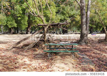 Photograph of flood damage in a recreational picnic area after flooding in the Hawkesbury river in Australia Photograph of flood damage in a recreational picnic area after flooding in the Hawkesbury river in Australia 93833416