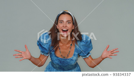 Excited amazed woman shocked by sudden victory game winning, lottery goal achievemen, good news, wow 93834337