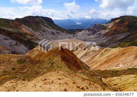 Explosive crater of Mt. Adatara and surrounding mountains in summer Explosive crater of Mt. Adatara and surrounding mountains in summer 93834677