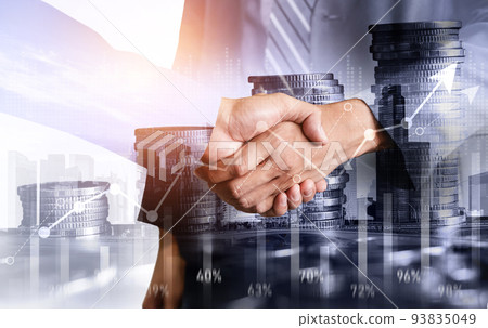Business handshake on finance prosperity and money technology asset background Business handshake on finance prosperity and money technology asset background 93835049