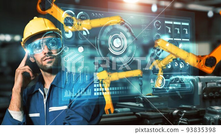 Engineer use cybernated robotic software control industry robot arm in factory Engineer use cybernated robotic software control industry robot arm in factory 93835398