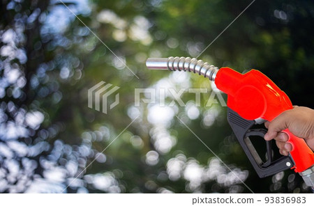 Fuel nozzle Hand holding Oil extracted from the background, clipingpart 93836983