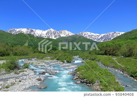 Shinshu Hakuba May Shirouma Sanzan with fresh greenery and remaining snow Shinshu Hakuba May Shirouma Sanzan with fresh greenery and remaining snow 93840408