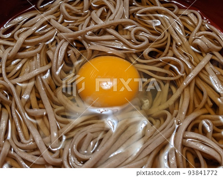 Tsukimi soba made by boiling dried buckwheat at home and dropping a raw egg Tsukimi soba made by boiling dried buckwheat at home and dropping a raw egg 93841772