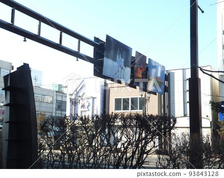 Cranes behind the signs in Kushiro city Cranes behind the signs in Kushiro city 93843128