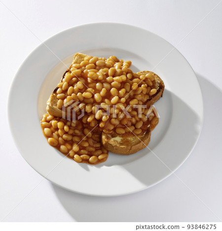 Baked beans on toast Baked beans on toast 93846275