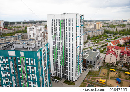 Residential complex, 25 storey and 16 storey residential buildings and townhouse, bird's eye view of the city. Western part of the Yekaterinburg city, Akademichesky 93847565
