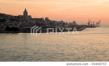 Harbor view of Lisbon's old town at sunrise Harbor view of Lisbon's old town at sunrise 93848733