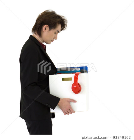 Young asian businessman in black suit feel sad, stressed and unhappy face holding paper box of belongings collected from office in the get fired day. Idea for unemployed person, work crisis. Side View 93849162