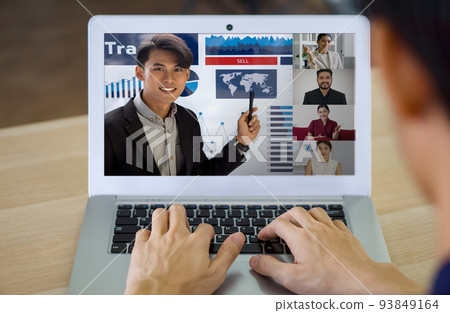 Back view of young man sit at desk at home have webcam conference on laptop computer with business partner or client. Work from home concept 93849164