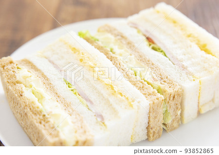 Delicious ham sandwich and egg sandwich 93852865