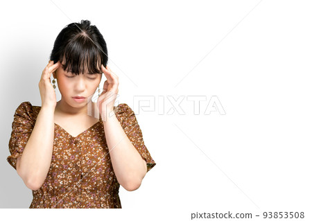 A woman with a headache A woman with a headache 93853508