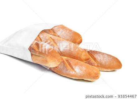 A French loaf in a white paper bag insulated on a white background. White bread in a craft bag. A paper bag full of bread. Classic French baguette A French loaf in a white paper bag insulated on a white background. White bread in a craft bag. A paper bag full of bread. Classic French baguette 93854467
