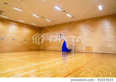 Light basketball gym with movable basket without people 93854634
