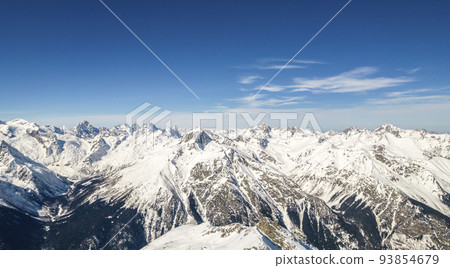 mountains in snow and sky with clouds  93854679