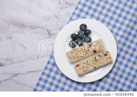 blue berry oat protein bars on table blue berry oat protein bars on table 93856440