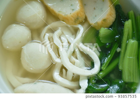 noodles flour made from fish meat topping ball and cabbage in soup on bowl noodles flour made from fish meat topping ball and cabbage in soup on bowl 93857535
