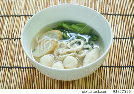 noodles flour made from fish meat topping ball and cabbage in soup on bowl  93857536